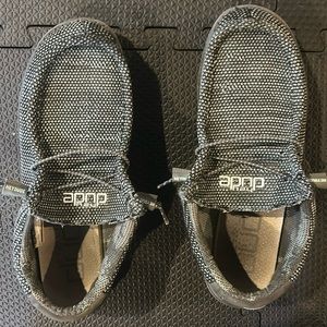 Selling black and white hey dudes, size 10, for 30 dollars
